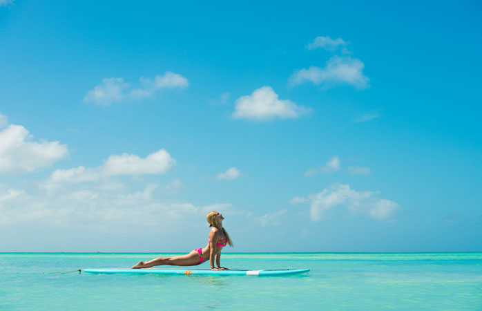 Kokeile SUP-joogaa Rachel Brathenin Island Yoga -retriitissä.