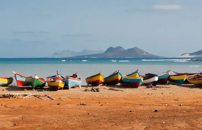 Fishing boats rest in Mindelo beach.