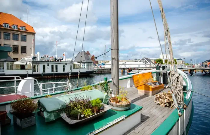 A boat's deck photographed from the side while anchored at the Copenhagen Harbor
The Port of Copenhagen is one of the largest ports in the Baltic Sea basin.
The port is divided into several different areas.