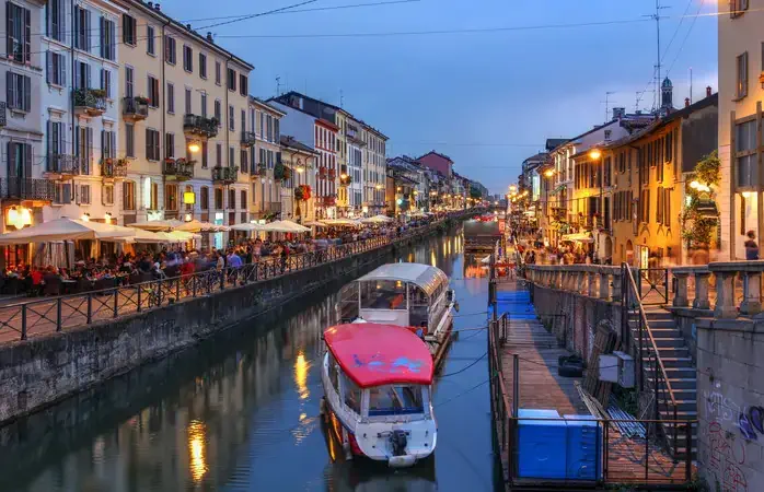 Evening scene along the Naviglio Grande canal in Milan, Italy.