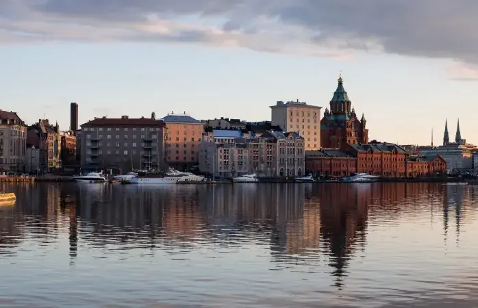 Uspenski Cathedral and Yacht Marina illuminated by the evening sun, Helsinki, Finland.
